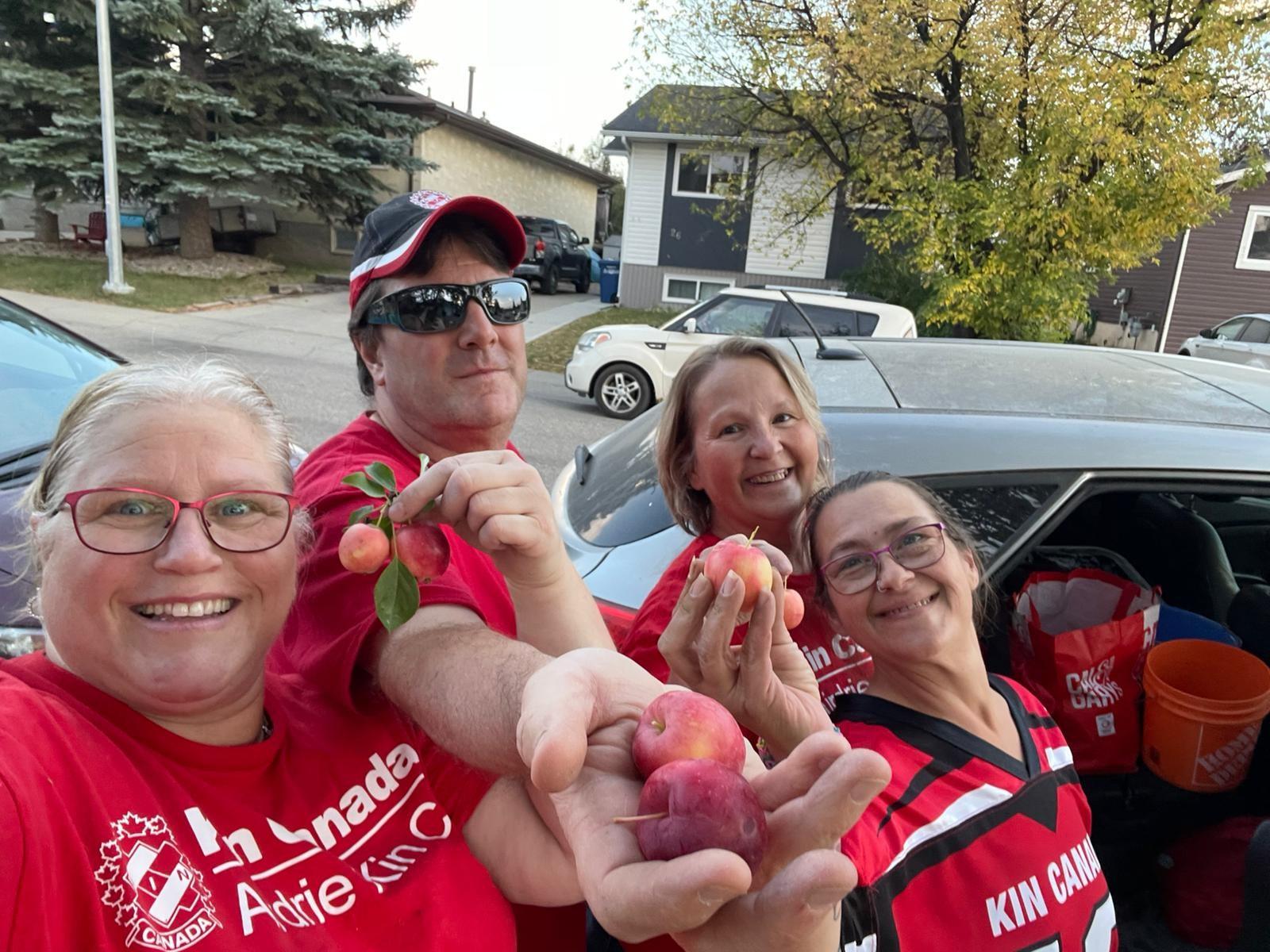 Volunteers with apples